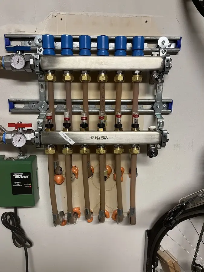 Plumber performing Water Heater Repair at a residential property in City of Orange